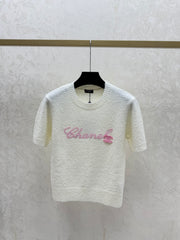 Color-blocked lettered crew neck knit short-sleeved top
