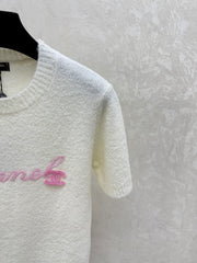 Color-blocked lettered crew neck knit short-sleeved top