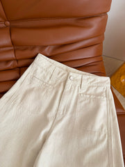 Jeans with leather patch detailing