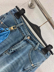 Jeans with a silk scarf chain embellishment