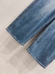 Jeans with a silk scarf chain embellishment