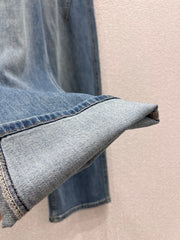 Jeans with a silk scarf chain embellishment