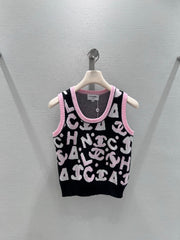 Black and pink color-blocked knit vest