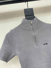 Half-zip stand-up collar knit short-sleeved top