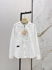 Round neck, ruffled trim, long-sleeved shirt