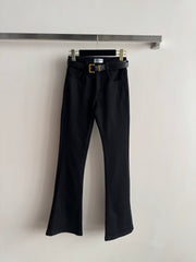 High-waisted embroidered flared pants.