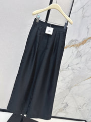 High-waisted elasticated pleated cotton trousers