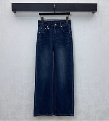 Pleated and distressed denim trousers