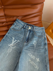 Heavy-duty rhinestone-embellished light blue jeans