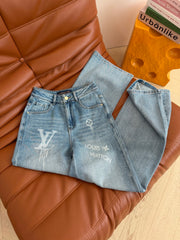 Heavy-duty rhinestone-embellished light blue jeans