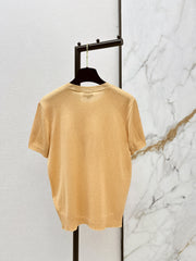 Warm-toned knit short-sleeved top