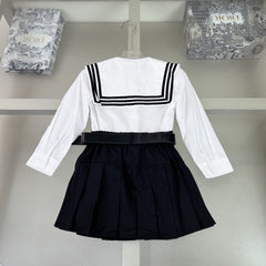 Navy-style shirt + pleated skirt