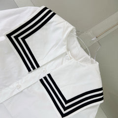 Navy-style shirt + pleated skirt