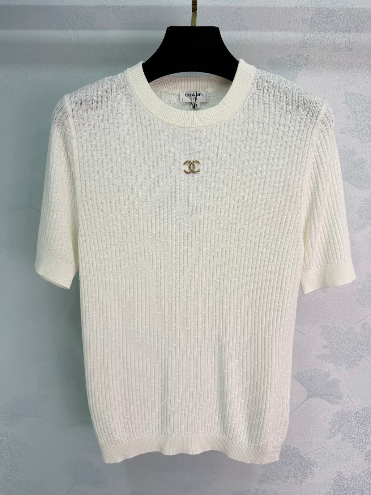 Vertical striped knit short-sleeved top