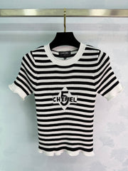 Black and white striped knit short-sleeved top