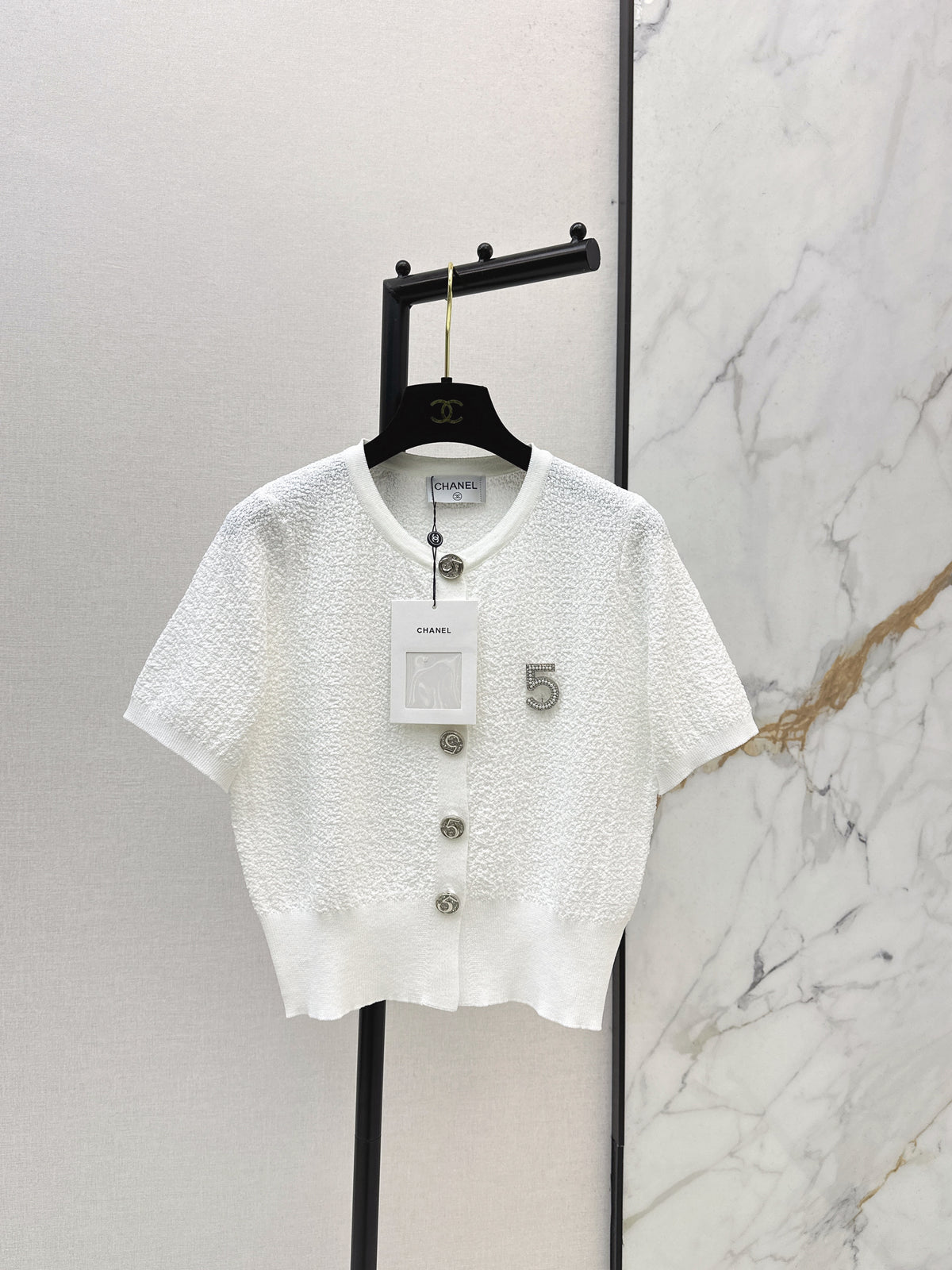 Hardware-embellished short-sleeved knit top