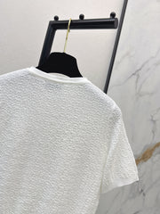 Hardware-embellished short-sleeved knit top