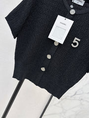 Hardware-embellished short-sleeved knit top