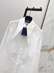 Minimalist white shirt with a long pointed collar