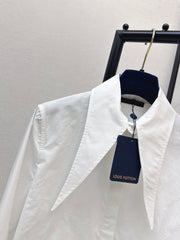 Minimalist white shirt with a long pointed collar