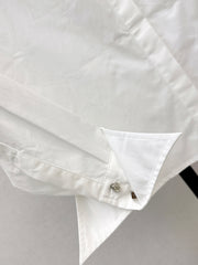 Minimalist white shirt with a long pointed collar