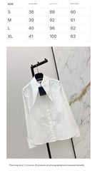 Minimalist white shirt with a long pointed collar