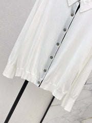 Color-blocked placket design with a turn-down collar