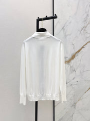 Color-blocked placket design with a turn-down collar