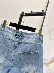 Denim shorts with back waist decoration