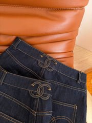 Jeans with a Twist-Lock Metal Buckle Design