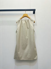 Beige vest dress with contrasting leather label