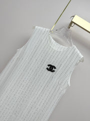 Beige vest dress with contrasting leather label