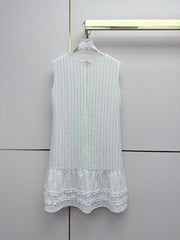 Beige vest dress with contrasting leather label