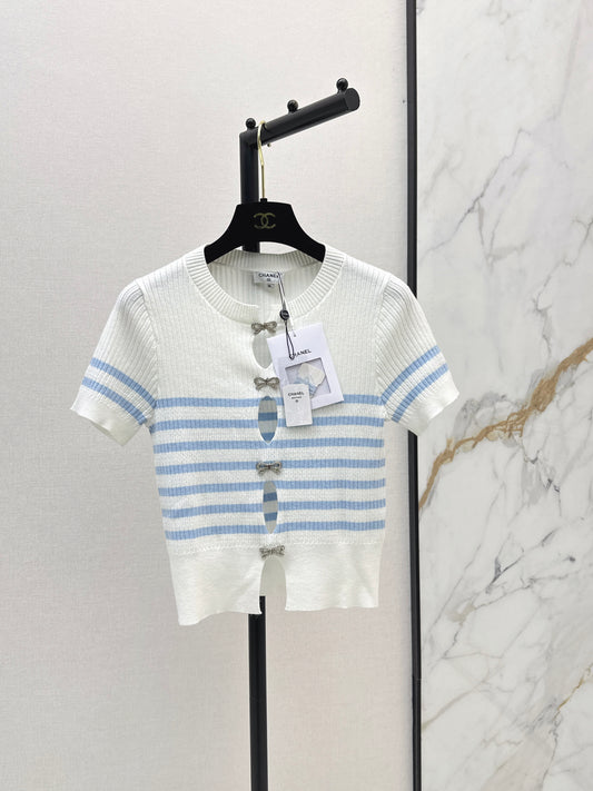 Striped knit top with bow embellishment