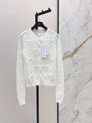 Bow-tie quilted jacquard openwork sweater