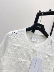 Bow-tie quilted jacquard openwork sweater