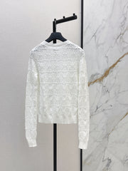 Bow-tie quilted jacquard openwork sweater