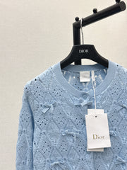 Bow-tie quilted jacquard openwork sweater