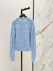 Bow-tie quilted jacquard openwork sweater