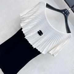 Black and white color-blocked knitwear
