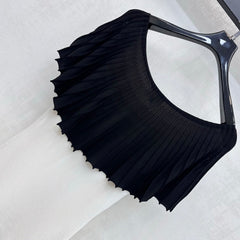 Black and white color-blocked knitwear