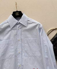Short-sleeved blue striped shirt