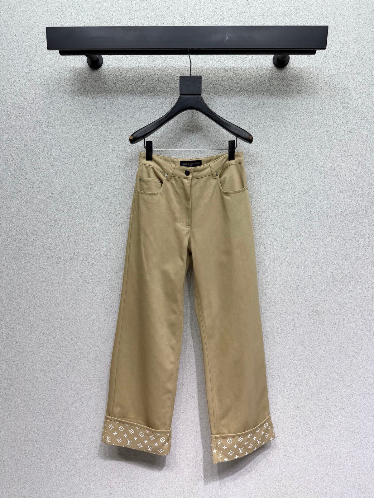Khaki rolled-up denim jeans