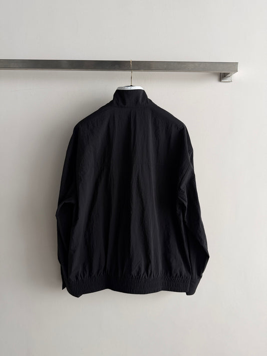 Black and white color-blocked jacket