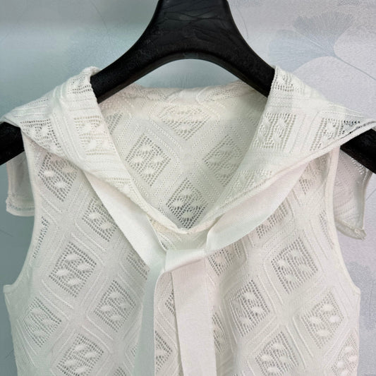 White knit vest