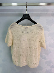 Off-white openwork knit short-sleeved top