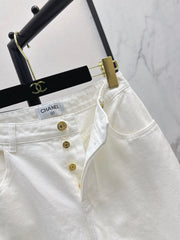 Wide-leg denim trousers with gold buttons