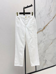 Slim-fit denim trousers with gold buttons