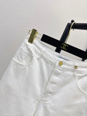 Slim-fit denim trousers with gold buttons