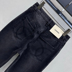 Straight-leg denim trousers with gold buttons